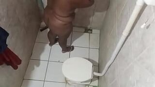 Hidden camera in the bathroom catches chubby stepmother - porn video
